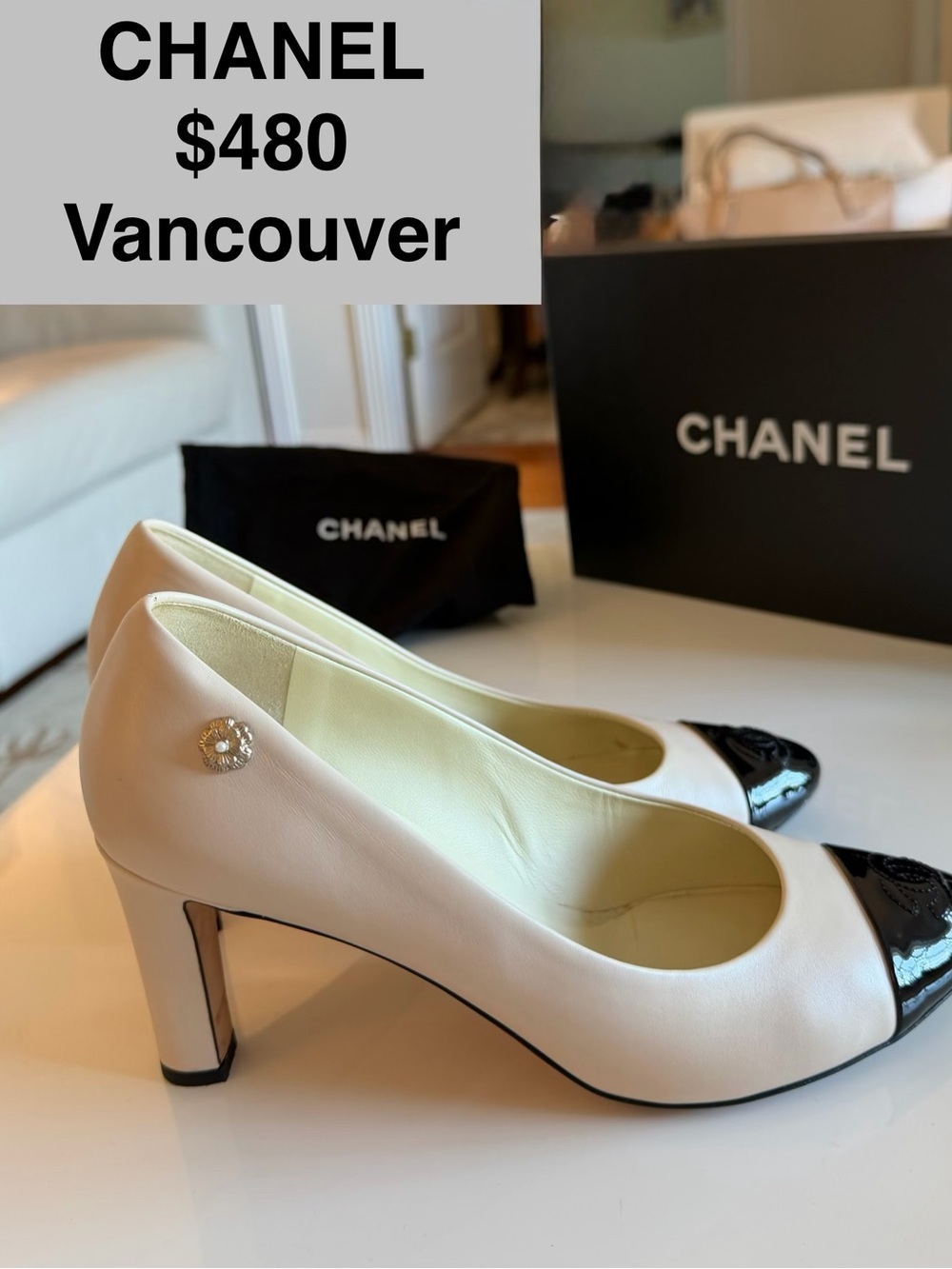 CHANEL Two-Tone Ivory Leather Pumps with Black Patent Cap Toe
